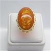 ANELLO IN ORO GIALLO 18 kt CON AMBRA INCISA OVALE TRE FIORI OGNK 02