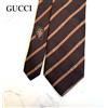 Gucci Cravatta Gucci nuova mai usata marrone a righe 100% seta Made in Italy