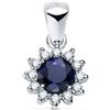 Pendente Oro 18K 750 Mls. Oro Bianco. Zaffiro 5 MM 0,56 Q. 12 Diamanti 0,17 Q.