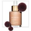 Clarins Skin Illusion 107 Beige 30ml Fondotinta Siero Effetto Naturale SPF15 Glo