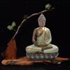 Statua di Buddha meditante con finitura in bronzo strutturato per la
