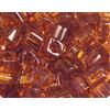 TOHO Perline giapponesi cubo trasparente bronzo 4mm. 100 g.