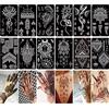 XMASIR Kit di 12 fogli di stencil per tatuaggi, per donne, body art, tatuaggi adesivi, motivo floreale, modelli per piedi a mano (12 pezzi)