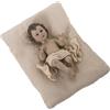 DRW Statuetta di un bambino Gesù in resina con cuscino di lino in beige 7x9x18 cm