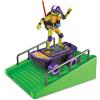 TORTUGAS NINJA Figura in Skateboard motorizzato, 10 trucchi per skateboard, rampa e action figure articolata 12 cm del film Caos Mutante, ragazzi e ragazze + 4 anni
