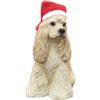 Cocker spaniel in cappello Babbo Natale isolato su bianco Foto stock