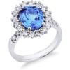 Gioielli di Valenza Anello in oro bianco 18k con Tanzanite ovale e diamanti a contorno e sul gambo.