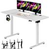 Shally Dogan Scrivania Motorizzata Elettrica Alzabile, Tavolo Regolabile in Altezza Ergonomico, Standing Desk, Gancio Cuffie, Ideale Ufficio e Casa Uso In Piedi o Seduto (Bianco, 140 x 60 x 72-117 cm)