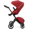 Stokke Xplory X, Ruby Red - Passeggino regolabile per il comfort del bambino e dei genitori - Imbottitura, Imbracatura e cerniera riflettente per una maggiore sicurezza - Si piega facilmente
