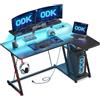ODK Scrivania Gaming Angolare con Luci LED e Prese di Corrente, 120x70 cm Postazione Gaming con Supporto per Monitor, Scrivania Computer con Ripiano di Stoccaggio Fibra di Carbonio Nera