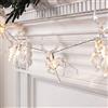 Lights4fun Catena Luminosa di 10 Renne Trasparenti con LED Bianco Caldo a Pile per Interni