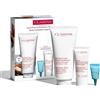 Clarins Gli Indispensabili Del Corpo 200ml + 3ml + 30ml Set con balsamo labbra, crema corpo e crema mani