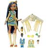 Monster High - Cleo de Nile, bambola snodata alla moda, dai capelli con ciocche blu e oro, con accessori e cagnolino, Giocattolo per Bambini 4+ Anni, HHK54