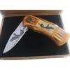 Coltello a serramanico con aquila