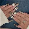 GlamRays 24 pezzi Leopard Press on Nails Set di unghie lunghe ovali finte con arco portachiavi bianco Charms Design Cheetah Chiodi adesivi in pizzo francese lucido