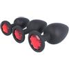 BONDAGERIE® Sextoy Plug Anale in Silicone Medico 100% Sicuro nero con gioiello Rosso, Sacchetto in Raso Incluso Taglia Kit 3 Plug S M L