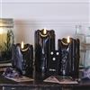 Lights4fun TruGlow® Set di 3 Candele a LED Fiamma Tremolante in Vera Cera Nera Effetto Colante a Pile con Timer e Telecomando Decorazione di Halloween per Interni