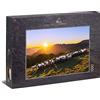 Ulmer Puzzleschmiede - Puzzle Pecora di montagna - Motivo di paesaggio con un gregge di pecore in montagna al tramonto