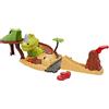 Mattel Disney Pixar Cars On The Road - Set Parco dei Dinosauri, playset con macchinina Saetta McQueen, un dinosauro e azione attivabile, giocattolo per bambini, 4+ anni, HNL99