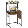 Bestier Piccolo tavolo per computer da 64 cm, con vano portaoggetti e cassetti, adatto per studio, camera da letto, soggiorno e spazi compatti (nero)