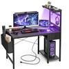 Grandder Scrivania Gaming 120x50cm con Presa di Corrente e Luci LED, Tavolo per PC Compatto con Ripiani Reversibili e Cassetto, Scrivania per Ufficio e Casa con Borsa Portaoggetti, Nero