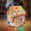 Le luci della casa in legno cambiano i giocattoli da tavolo con pulsanti per