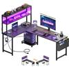 Coleshome Scrivania Gaming con LED e Prese, 155 × 100 cm Scrivania Gaming Angolare Reversibile con Scaffali Portaoggetti, Scrivania Angolare con Borsa Portaoggetti per Giocatori, Nero