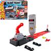Mattel Hot Wheels Racing Formula 1 - Griglia di Partenza, set pista con 2 macchinine da F1 incluse, griglia e torre di partenza con lanciatori e bandiera a scacchi, Mattel,Eta 3+