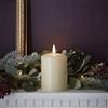 Lights4fun TruGlow™ - 4 candele a LED in vera cera con fiamma LED bianca calda, funzionamento a batteria, 10 cm