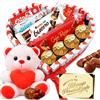 Premium Moments Cuore Sorpresa Regalo con Peluche e Oltre 40 Cioccolatini e Praline - Ferrero Rocher, Lindor, Caja Roja, Kinder - Biglietto Personalizzato