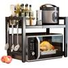 YOPOTIKA Scaffale per microonde, supporto da cucina espandibile con porta accessori, ripiano telescopico in acciaio al carbonio, nero, organizer per microonde e utensili da cucina, ideale per cucine