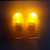 Rebetomo 2 paia di pollici luminosi (corti) trucchi magici d'Lite illuminazione pollice LED lampeggiante punta delle dita accessori magia giocattoli mago espedienti puntelli (giallo)