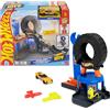 Hot Wheels City - Mega Centro Gomme, pista multidirezionale con carro attrezzi e veicolo incluso, l'officina ruota di 360 gradi e diventa una rampa, 3+ anni, JHL75