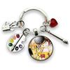 So Sweet Regalo portachiavi « Il bacio », pittore, dipinto, tela con cabochon di vetro e ciondoli, tavolozza, pennello, pastello e cuore, creazione