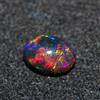 Gemme Naturali Etiopia Opale Nero Multi Fire Cabochon Ovale 7x5 mm AAA