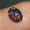 Gemma Sciolta Opale Nero Etiopico Naturale AAA Ovale Multi Fire Cabochon 7x5 mm