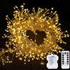 DINOWIN Catena di luci a LED a Forma di Petardini con Telecomando 29,5Ft 300 LED Fuochi d'artificio Catena Luminosa 8 Modalità Rame Fata Luci Stringa Per Feste Natale Halloween (Bianco caldo)