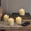 Lights4fun TruGlow® Set di 4 Candele Votive a LED Fiamma Tremolante in Vera Cera Avorio Effetto Colante a Pile con Timer e Telecomando Decorazione per Interni