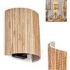 hofstein Lampada da parete Bongal, lampada dal design boho in metallo/erba marina in nero/natura, spot da parete con paralume rotondo in erba marina, effetto up&down sulla parete, 1 luce, senza lampadina/e