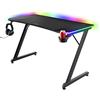 GXTrust Trust Gaming GXT 710 Luminus Pro Scrivania Gaming 120x60 con Led Rgb, Caricatore Wireless Integrato da 10W, 10 Modalità di Colore, Postazione Gaming Con Portabicchiere, Gancio Per Cuffie, Nero