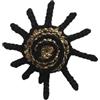 Handmade Spilla uncinetto con spirale marina stilizzata nera e oro - gioiello tessile artigianale