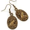 Avalaya Orecchini pendenti ovali con cammeo, color bronzo, 45 mm di lunghezza, Misura unica, Bronzo