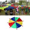 Paracadute multicolore per bambini con 8 maniglie, ideale per giochi di gruppo