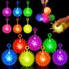 Mecctuck 12 palline luminose a forma di riccio, giocattolo per bambini, con linguetta per strappare, regali di compleanno per bambini, gadget per feste, piccoli regali per ragazzi e ragazze