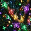 Dongcill Catena luminosa a energia solare per esterni, 7 m, 50 farfalle, sensore di luce intelligente, impermeabile, ghirlanda di luci decorative per esterni, giardino, balcone, matrimoni, feste