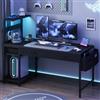 YOUDENOVA Scrivania Gaming Reversibile con LED e Multipresa, Scrivania per Computer 120 cm Compatta con 2 Cassetti, Mensola Regolabile, Tavolo PC per Piccole Camere e Uffici Domestici Nero