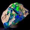 AK GEMS AND JEWELLERY Gemma Opale Nero Grezzo Etiopia Fire, Naturale 15.4Ct 21x14 mm