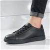 Semplici sneakers da skateboard in pelle nera, scarpe basse con lacci per tutti i giorni, calzature versatili business casual con suola in gomma antiscivolo per uomo