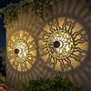 Gardencave Confezione da 4 luci solari per recinzione, in metallo, a energia solare, a tema sole, luna, impermeabili, 10 lumen, LED, colore del viso