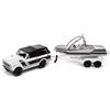 Johnny Lightning 1979 International Scout II w/Malibu Boat e Trailer, (JLSP205B)